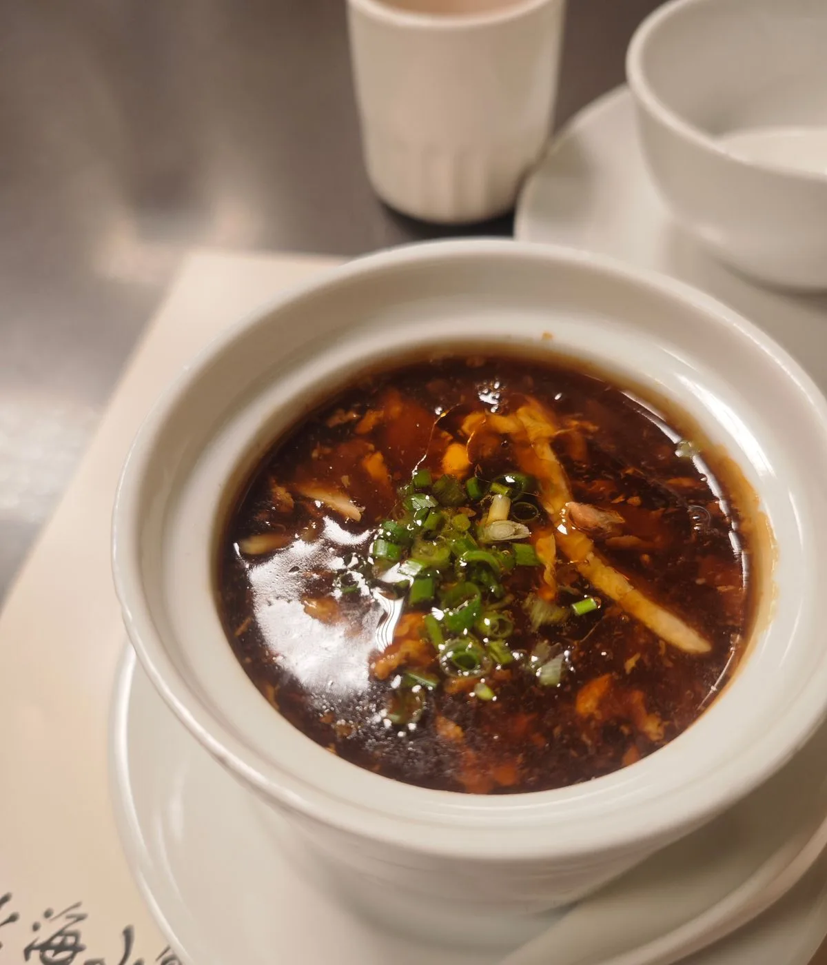 Classic Hot and Sour Soup plated Chinese dinner