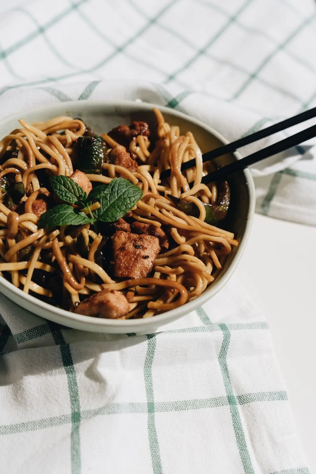 Spicy Beef Szechuan Noodles plated Chinese dinner