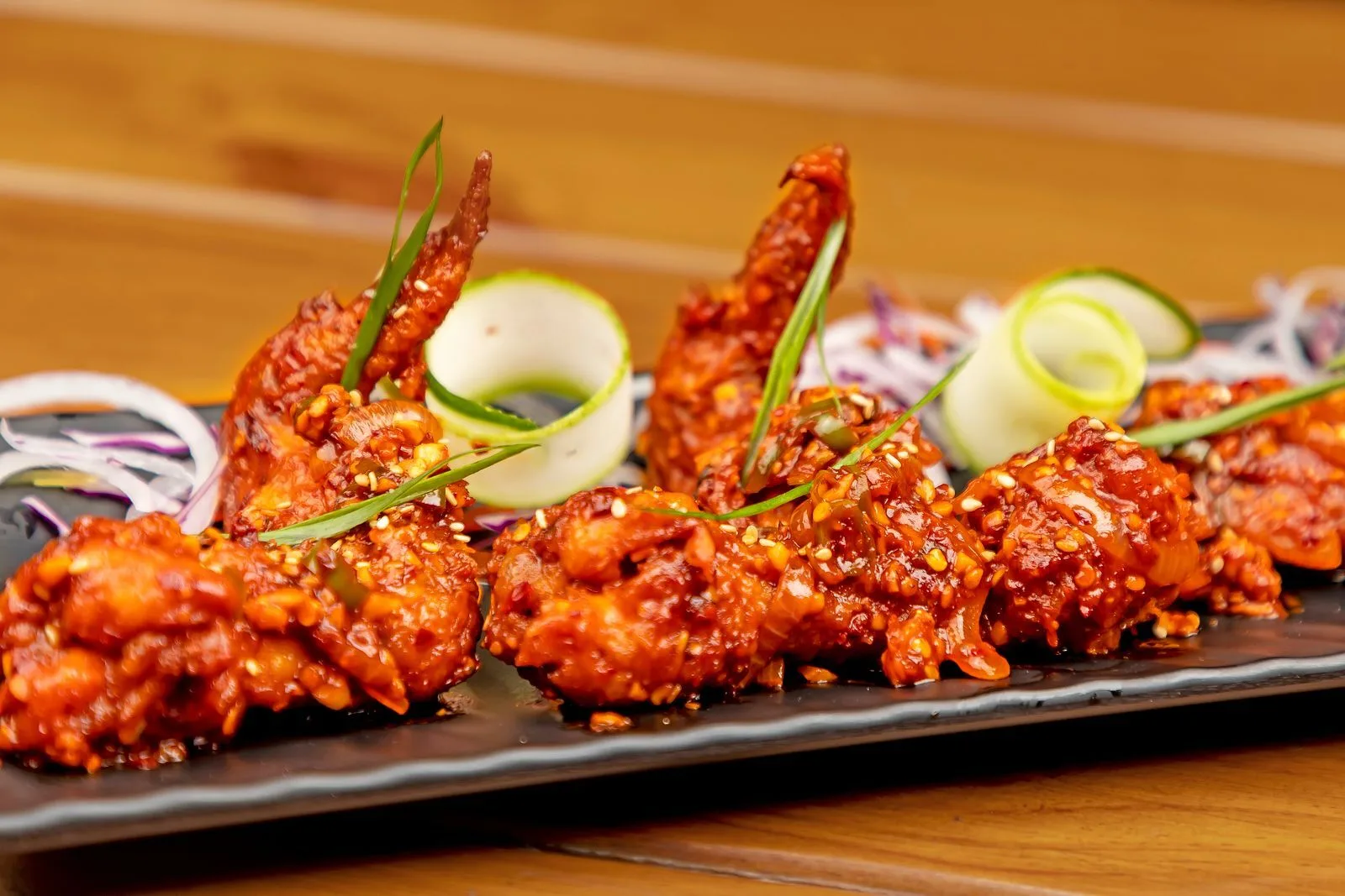 Soy Ginger Baked Chicken Wings plated Chinese dinner