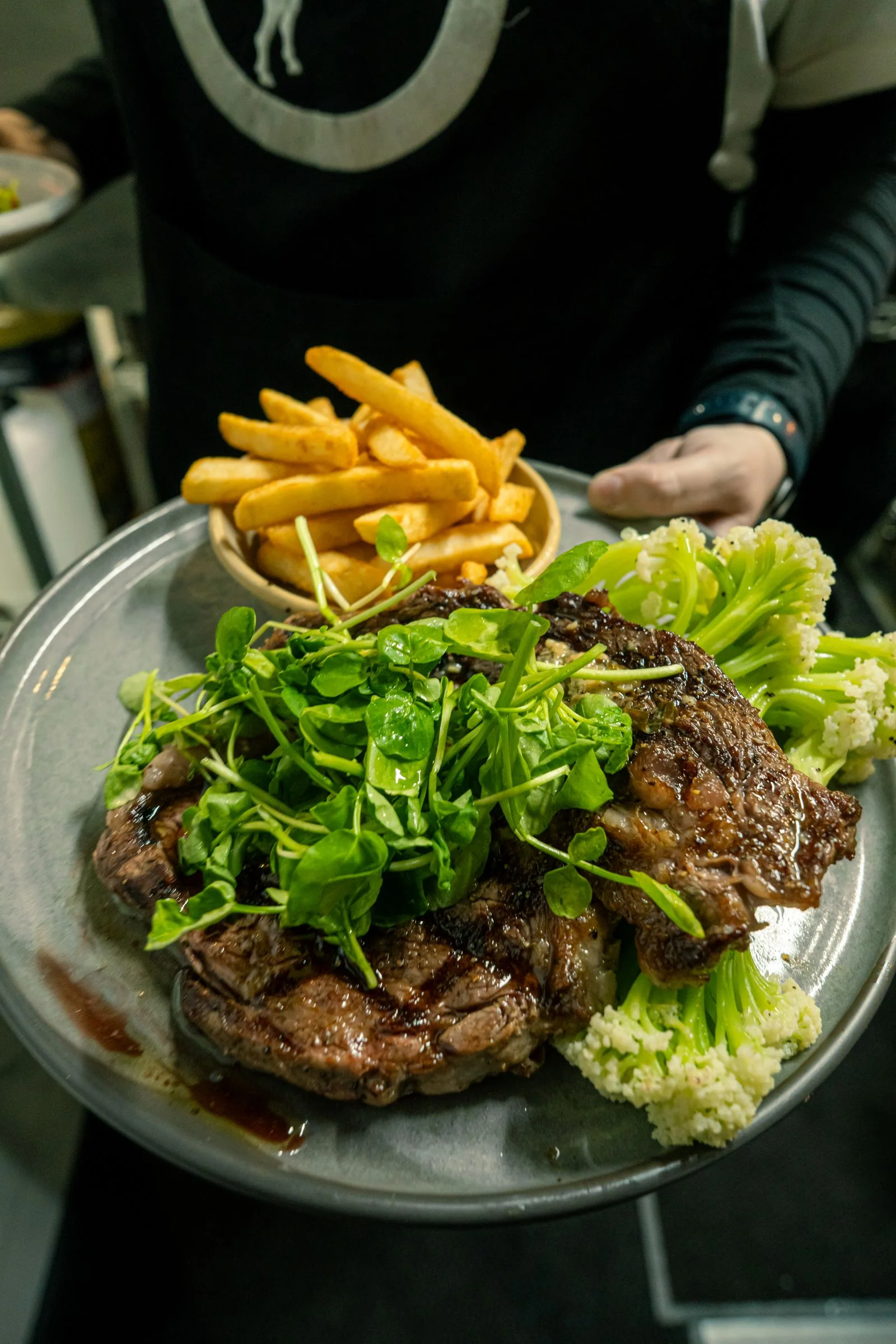 Steak Frites Style plated French meal