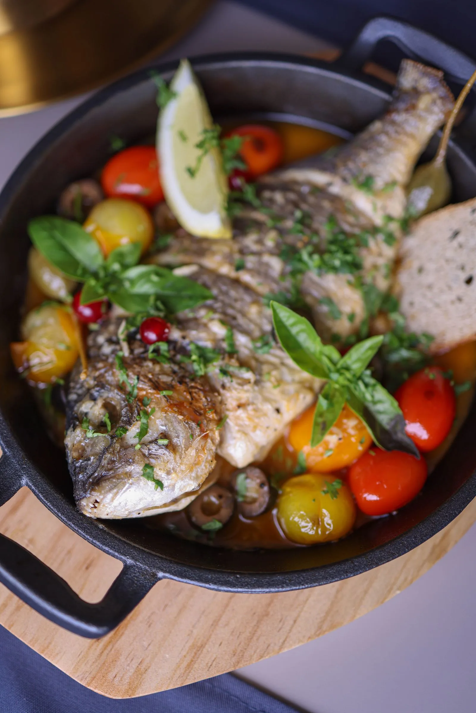 Greek-Style Baked Fish plated Mediterranean dinner