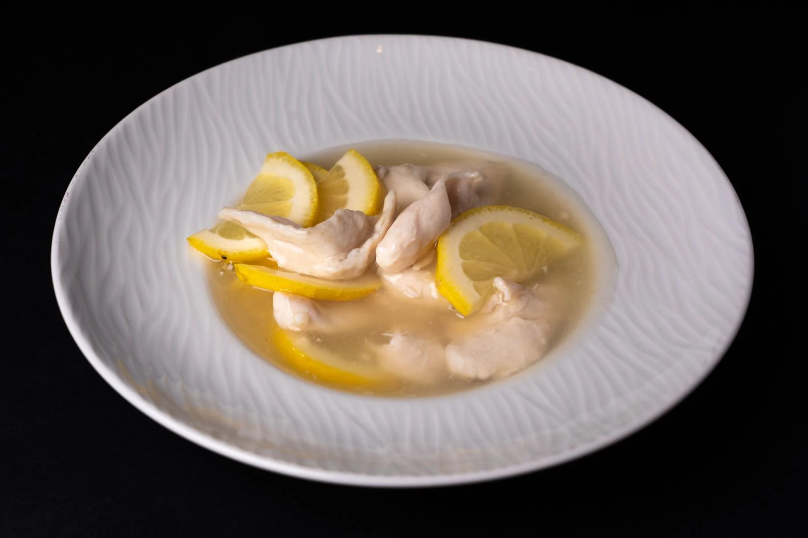 Avgolemono Chicken Soup plated Mediterranean meal
