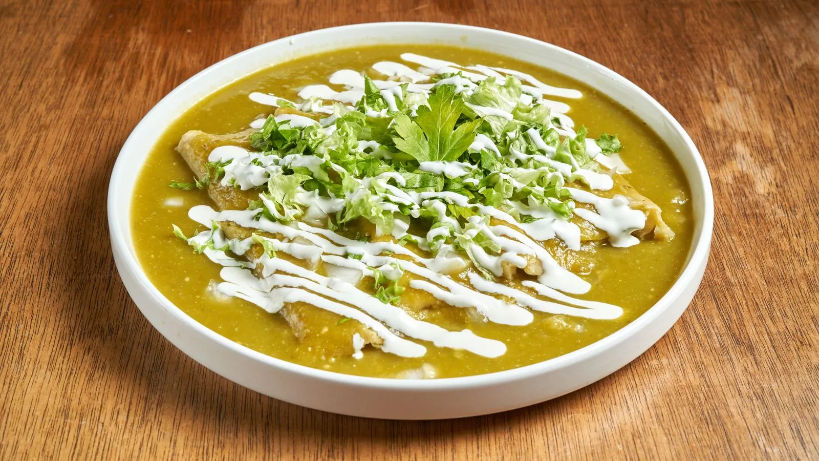 Chicken Enchiladas Verdes plated Mexican meal