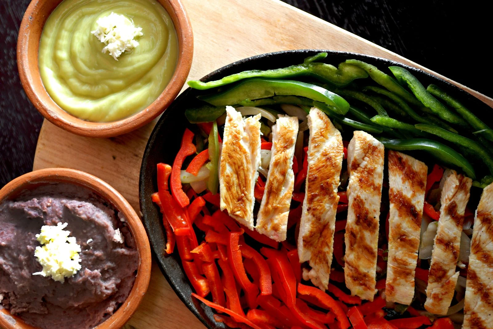 Sizzling Chicken Fajitas with Peppers plated Mexican meal