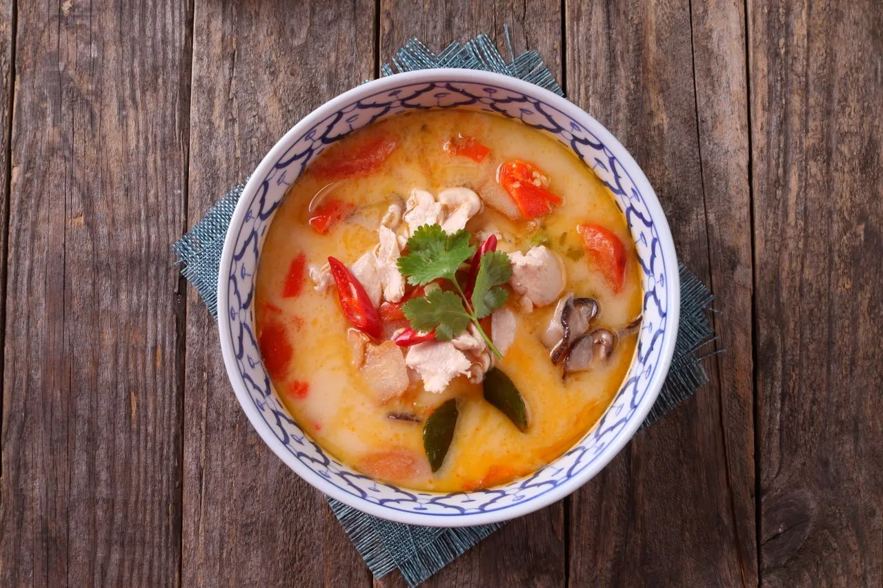 Creamy Tom Kha Gai plated Thai dinner