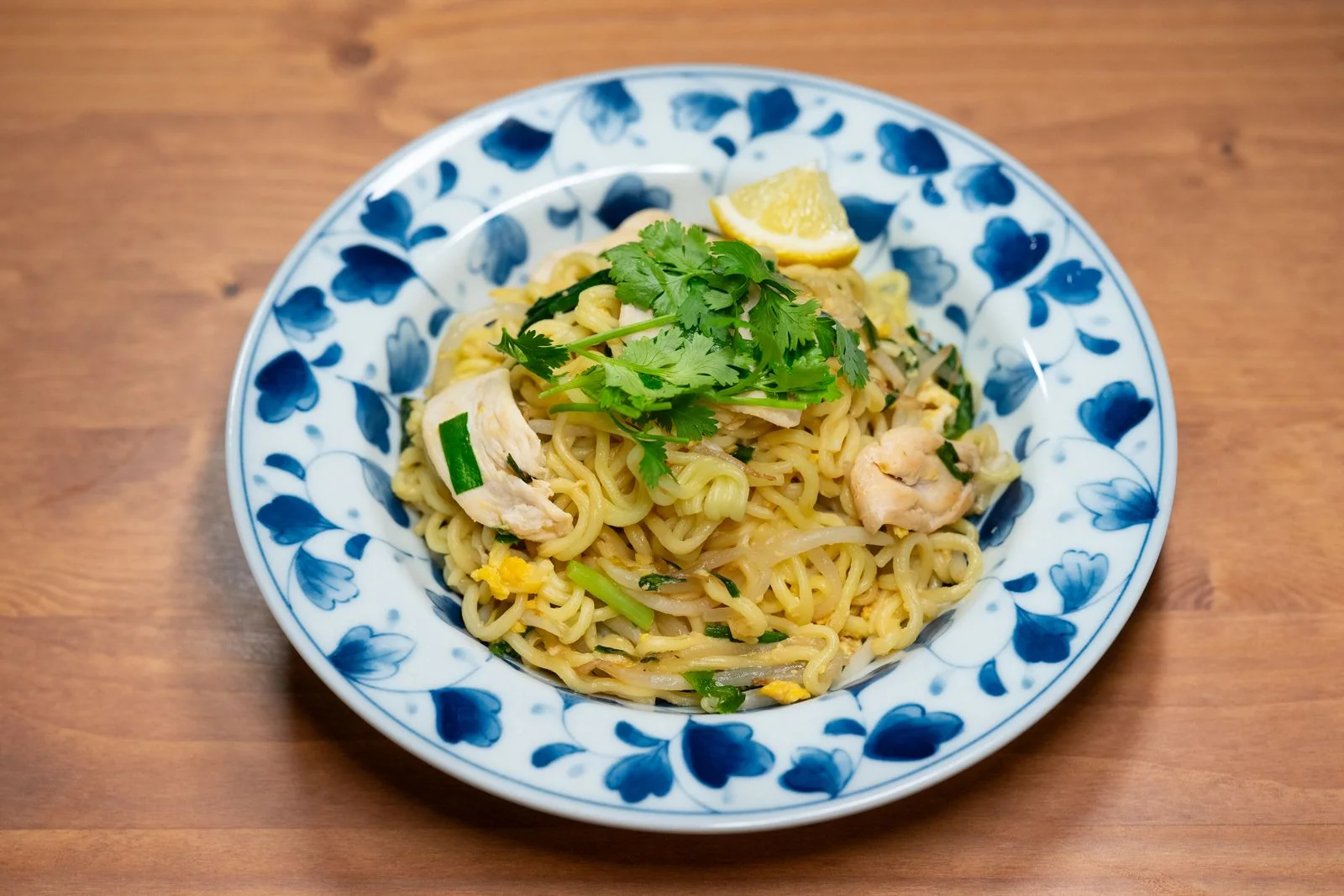Drunken Noodles (Pad Kee Mao style) plated Thai meal