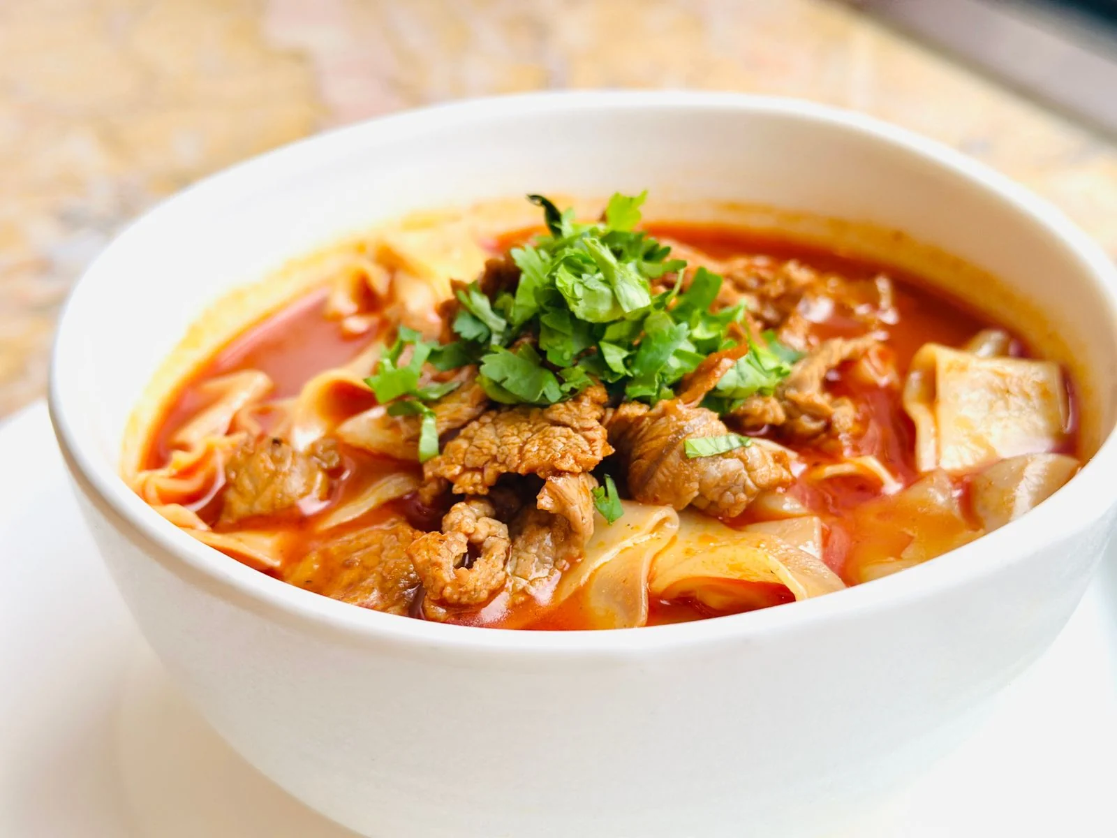 Boat Noodle Inspired Beef Soup plated Thai meal