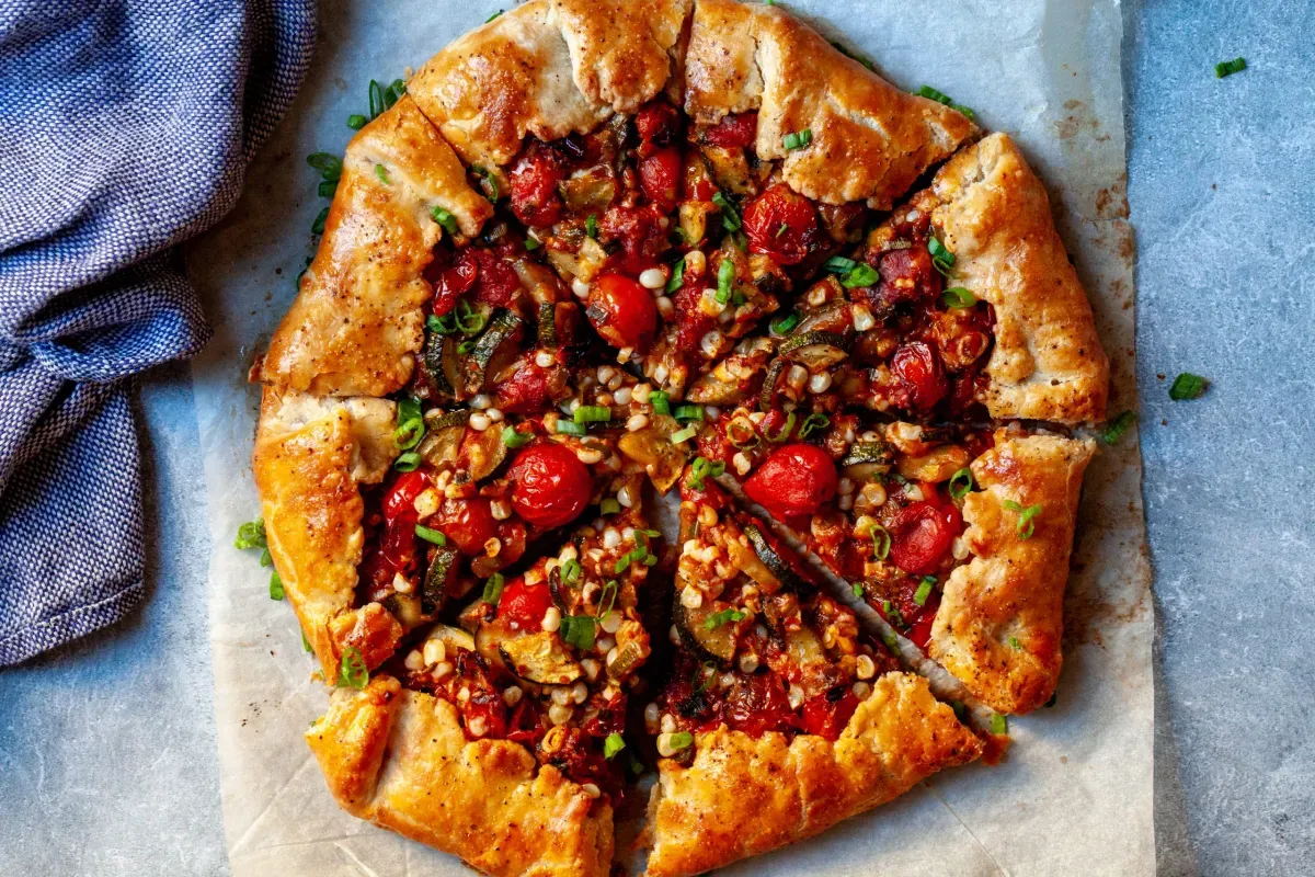 burst tomato galette with corn and zucchini