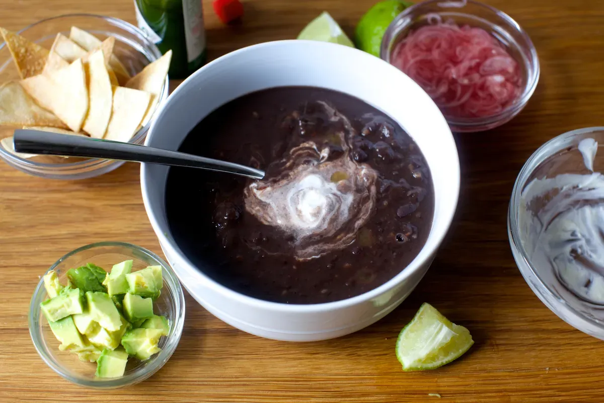 black bean soup + toasted cumin seed crema