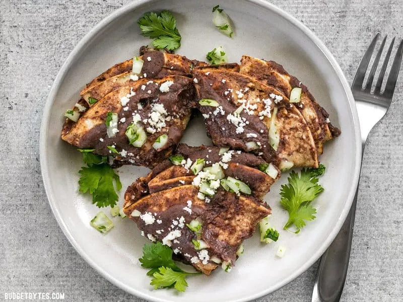 Enfrijoladas - Tortillas in Black Bean Sauce
