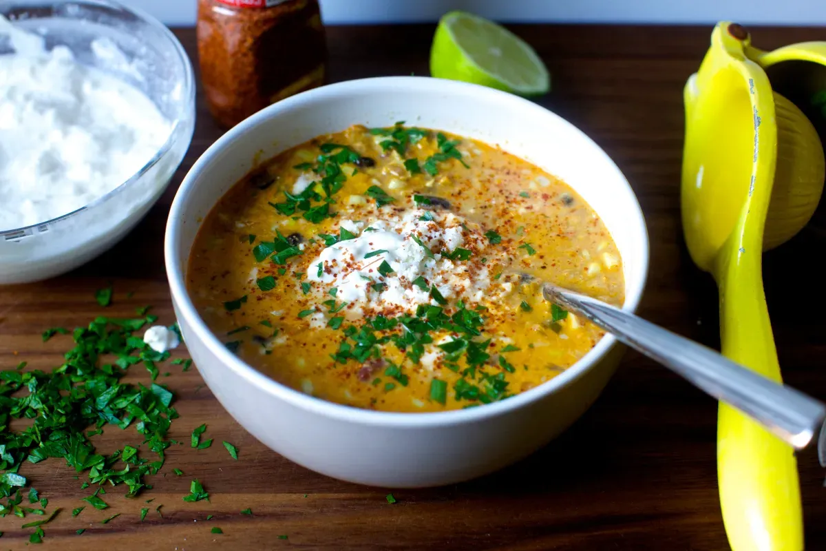 corn chowder with chile, lime and cotija