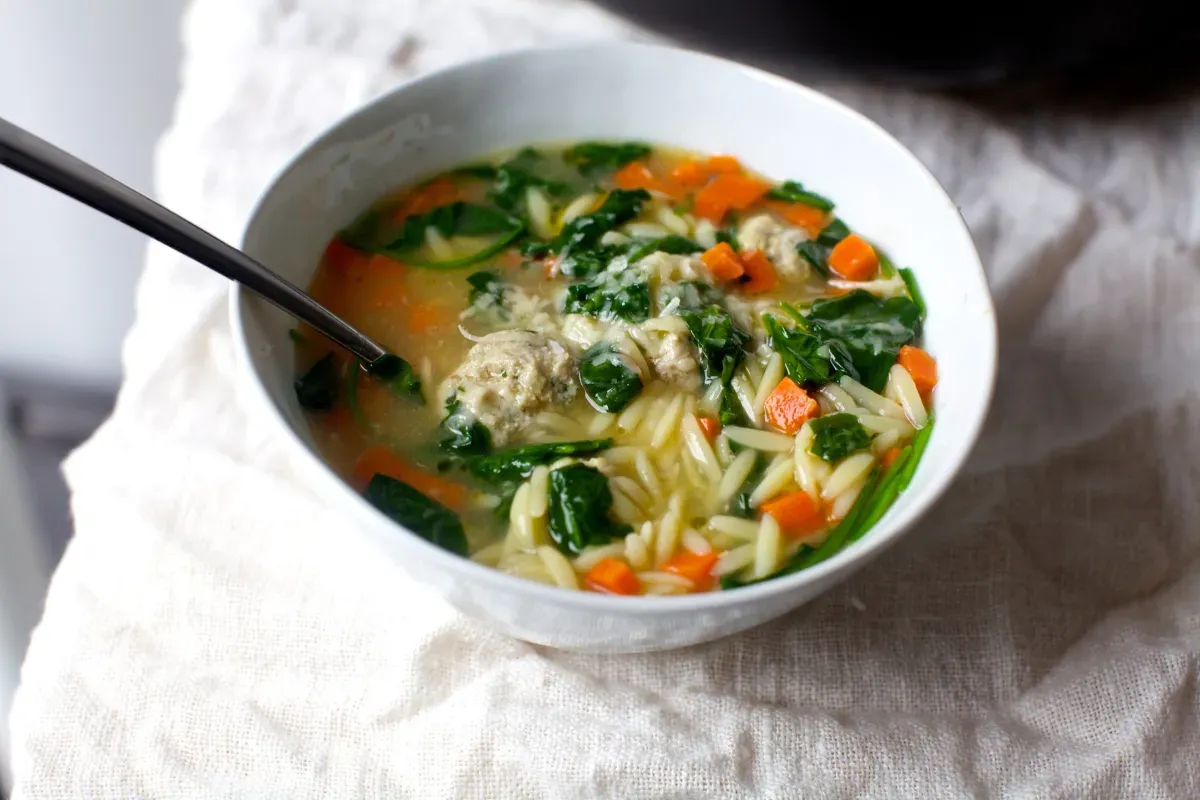 greens, orzo and meatball soup