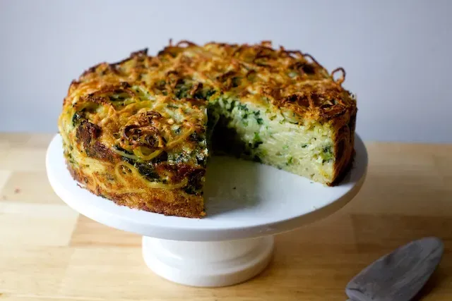 spaghetti pie with pecorino and black pepper